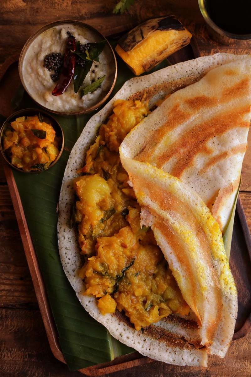 Authentic South Indian dosa served with sambar and chutneys